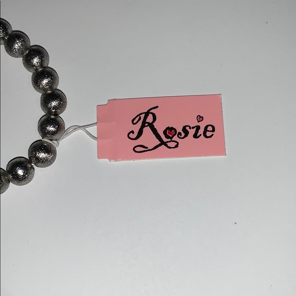 A silver bracelet. - Picture 2 of 2